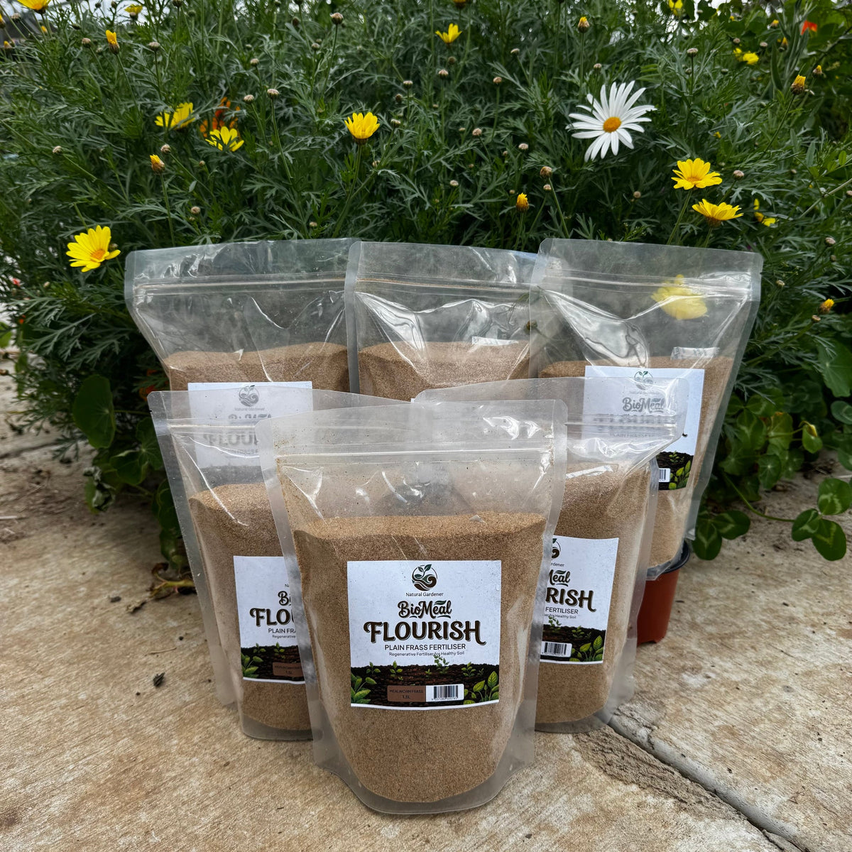 Five clear stand-up pouches of Bio Meal Flourish Palin Frass Fertiliser bags.